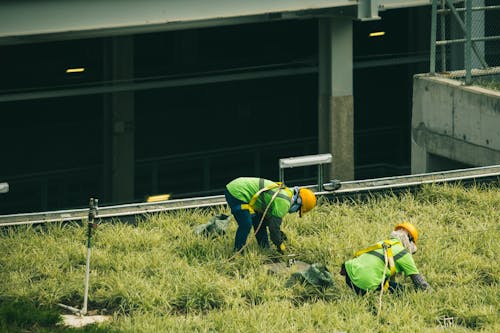 Free Two Workers Near Building Stock Photo