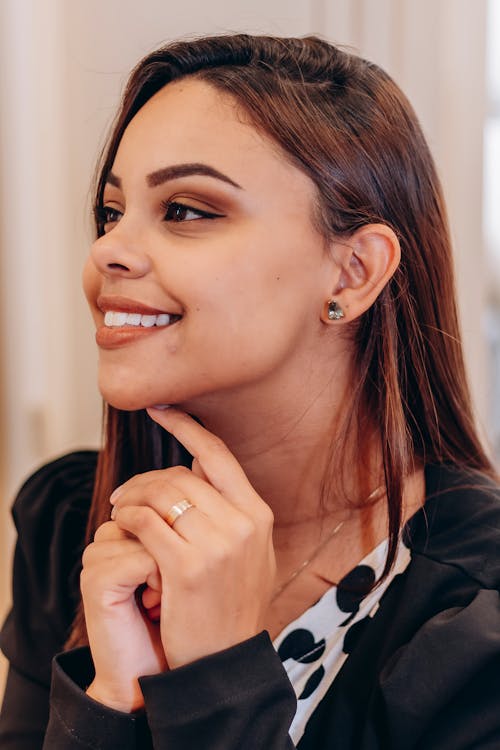 Portrait of a Smiling Young Woman with Brown Hair