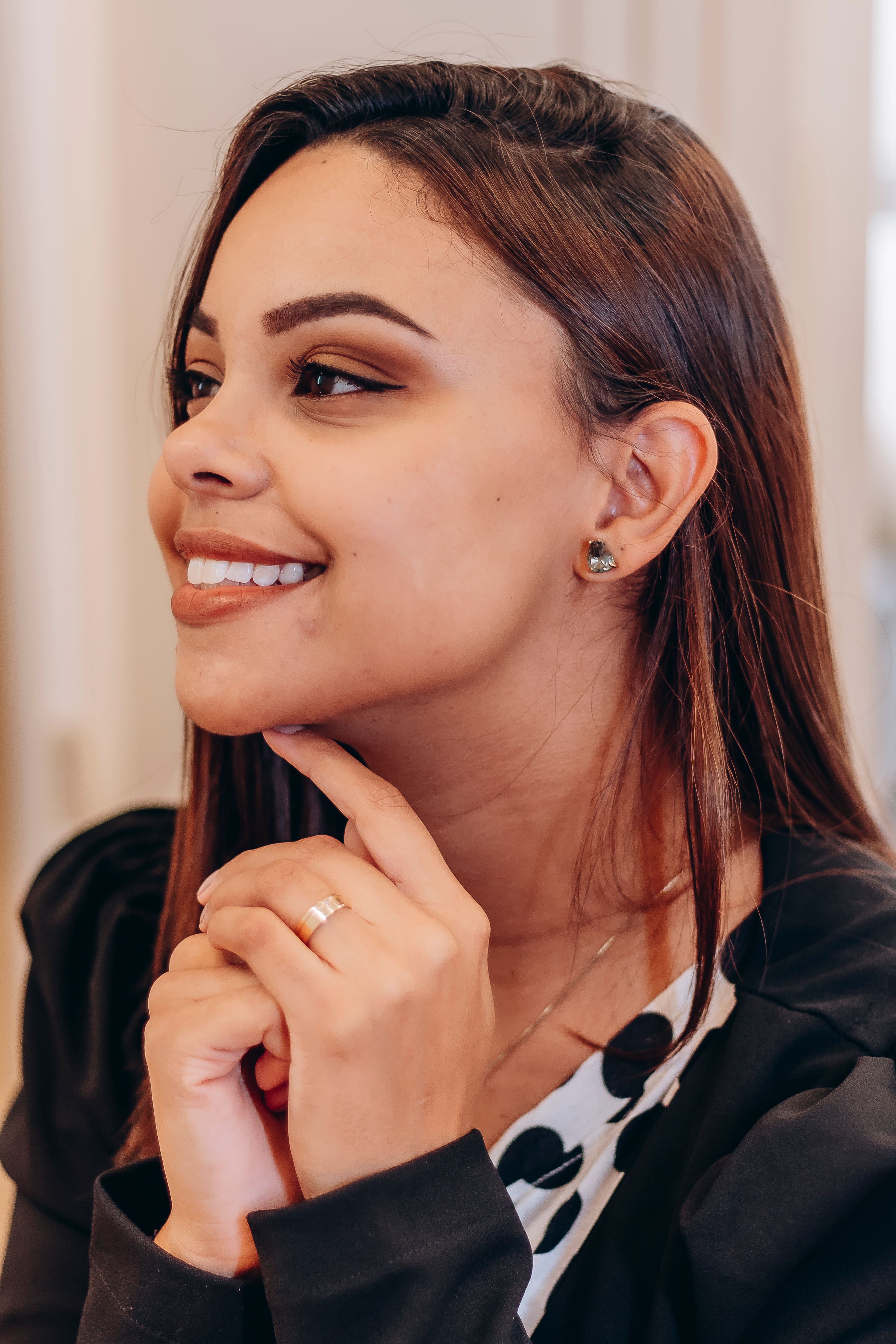 Portrait of a Smiling Young Woman with Brown Hair · Free Stock Photo