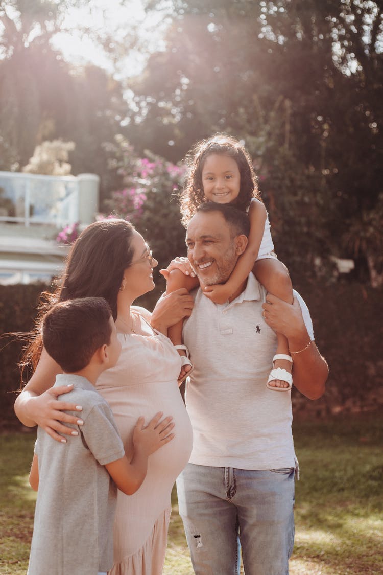 Happy Family In Garden