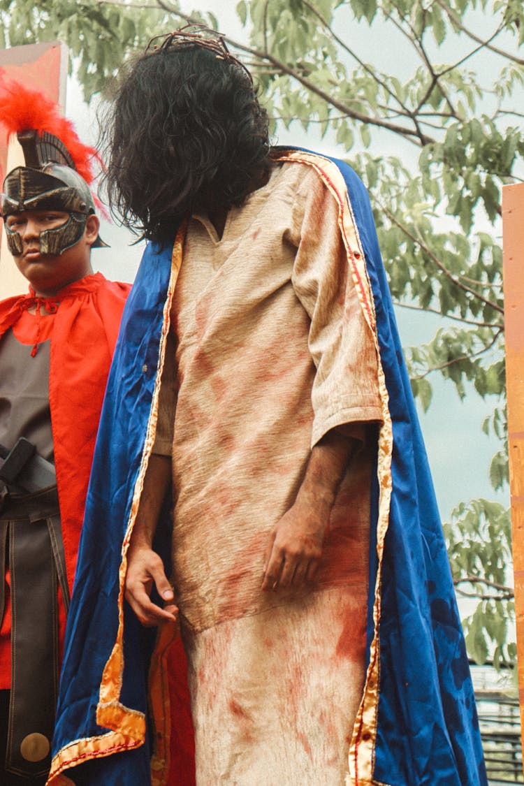 Man In Costume On Masquerade Outdoors