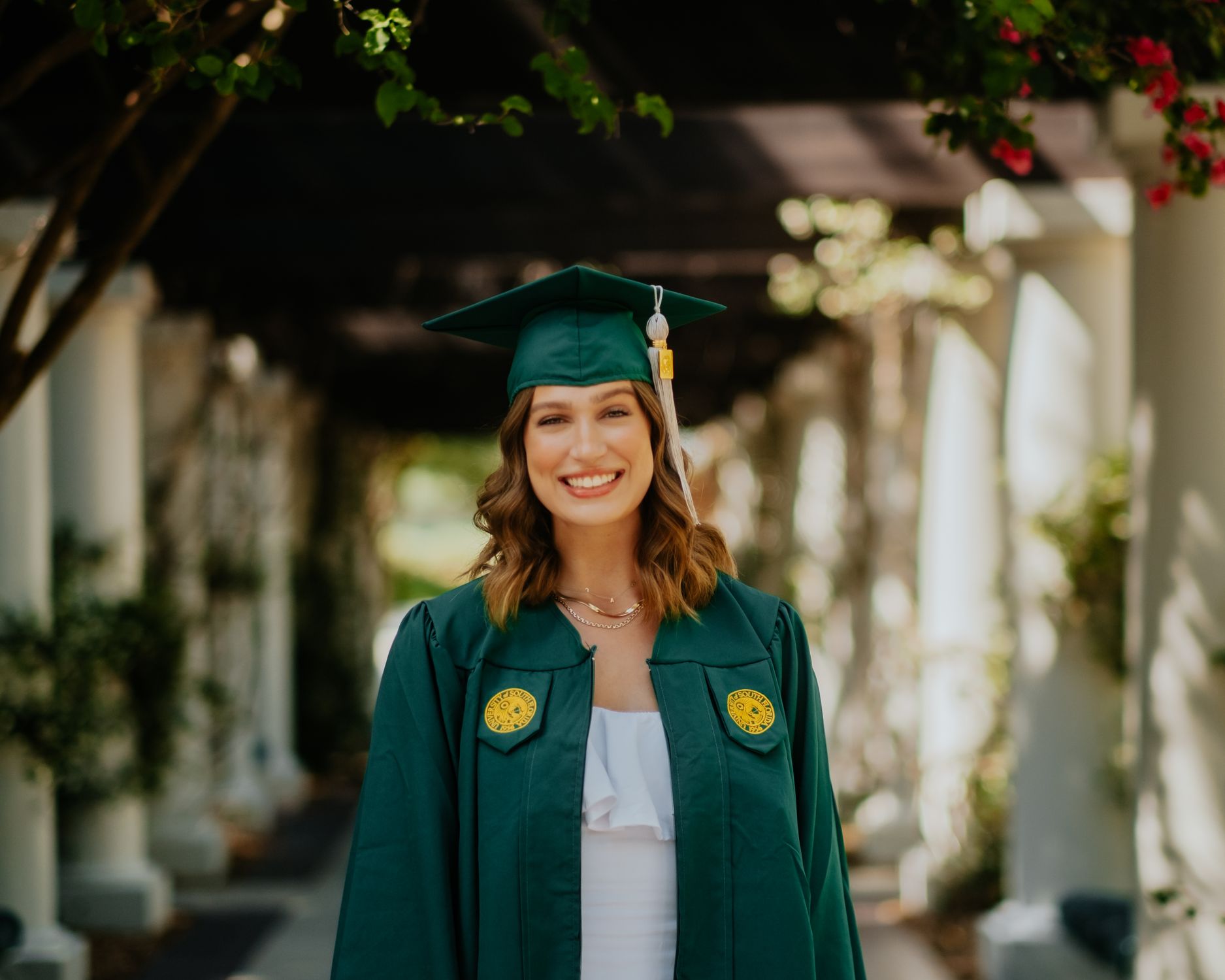Beautiful Spring Graduation A beautiful woman in a green graduation gown · Free Stock Photo