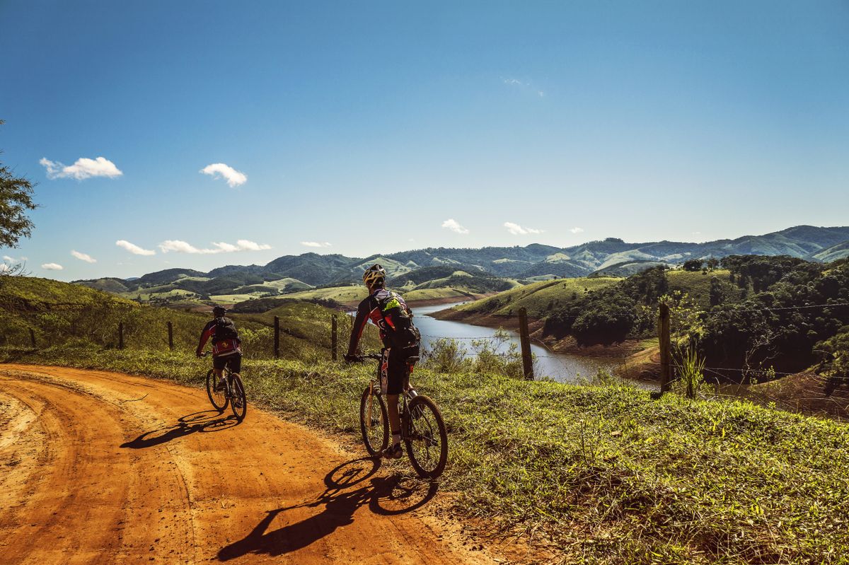 Cyclists riding together on an open route