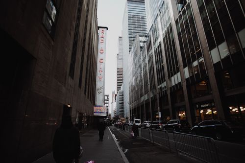 Free Iconic view of Radio City Music Hall surrounded by skyscrapers in NYC. Stock Photo