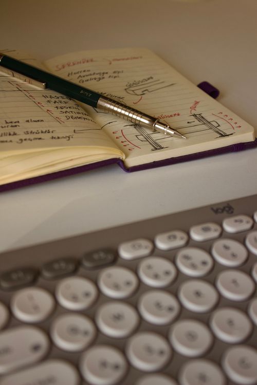 Keyboard Writing Notebook Keyboard and Notebook · Free Stock Photo