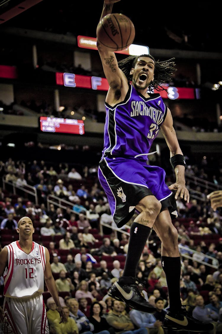 Man Playing Basketball