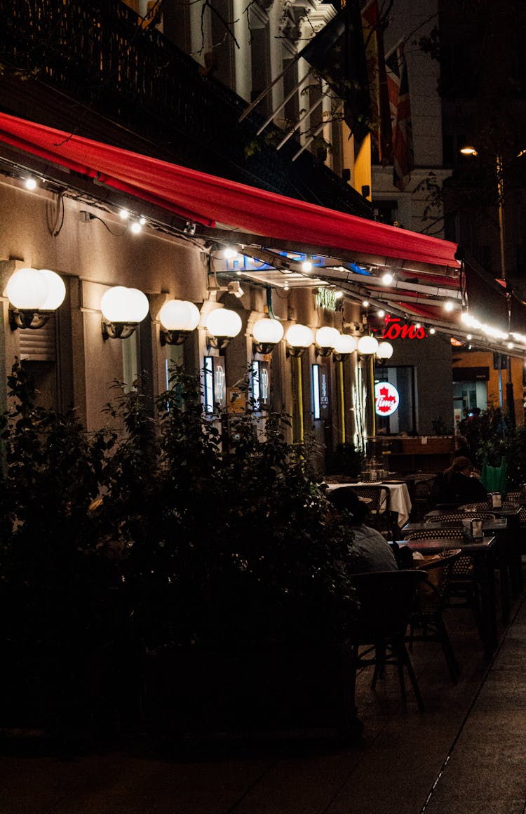 Illuminated Cafe At Night