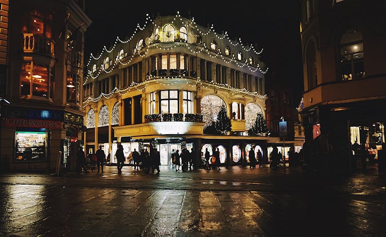 Photo Of People On Road At Night