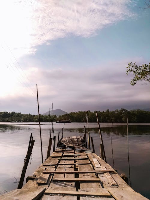 Crooked Wooden Pier on the River