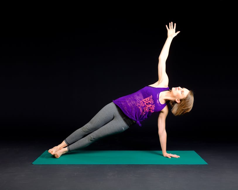 Woman in Purple Tank Top and Gray Sweat Pants