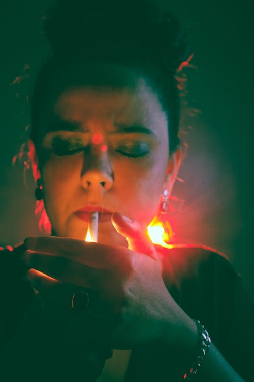 Woman Lighting Cigarette