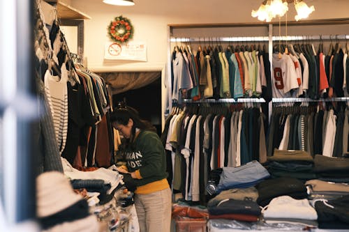 Woman Working at Clothes Store