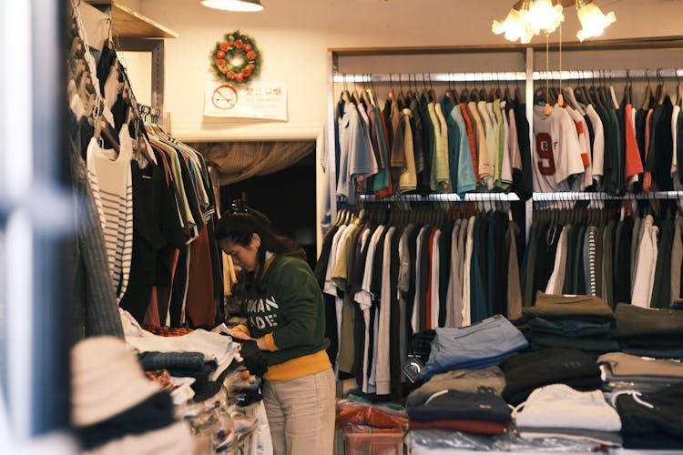 Woman Working At Clothes Store