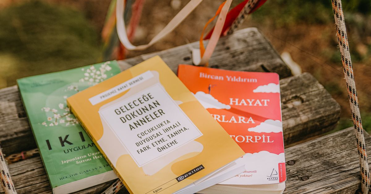 Books in Turkish on Wooden Swing · Free Stock Photo