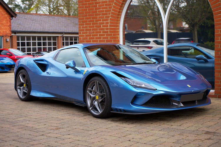 Blue Ferrari F8 In The Parking Lot