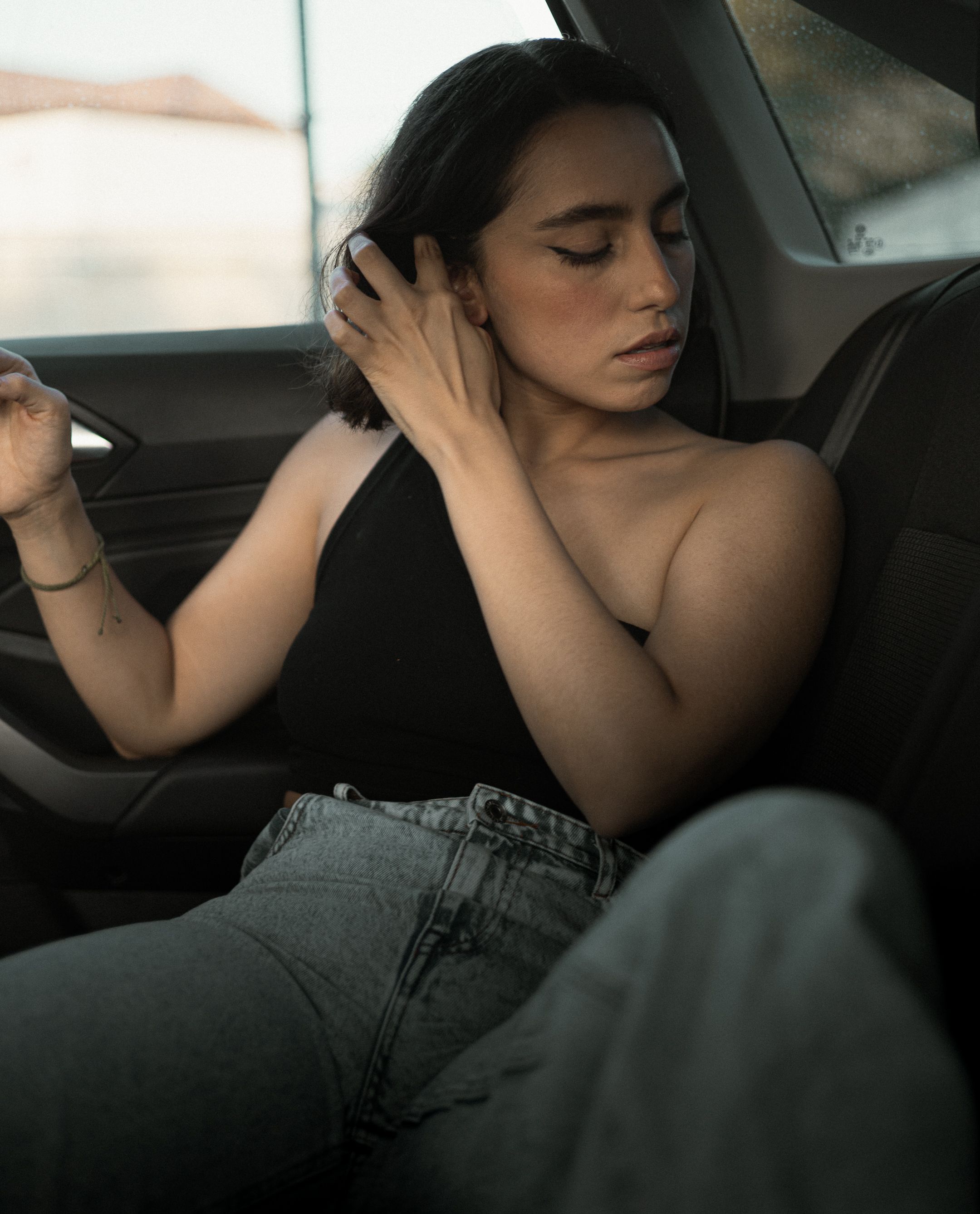 Brunette Woman Sitting in Car · Free Stock Photo