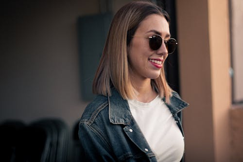 Smiling Woman in Sunglasses