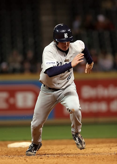 Foto d'estoc gratuïta de acció, atleta, beisbol