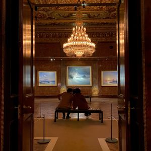 Visitors looking at paintings in a gallery — Emine Lmn on Pexels