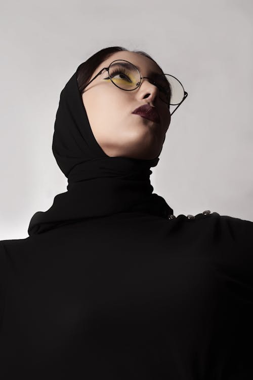 Woman Wearing Eyeglasses and Headscarf