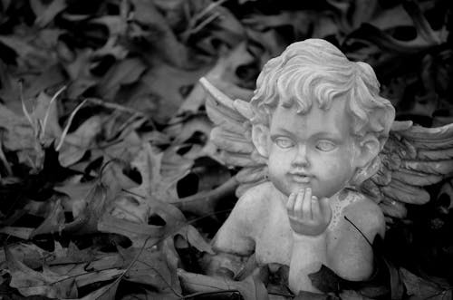 Sculpture of Baby Angel in Black and White