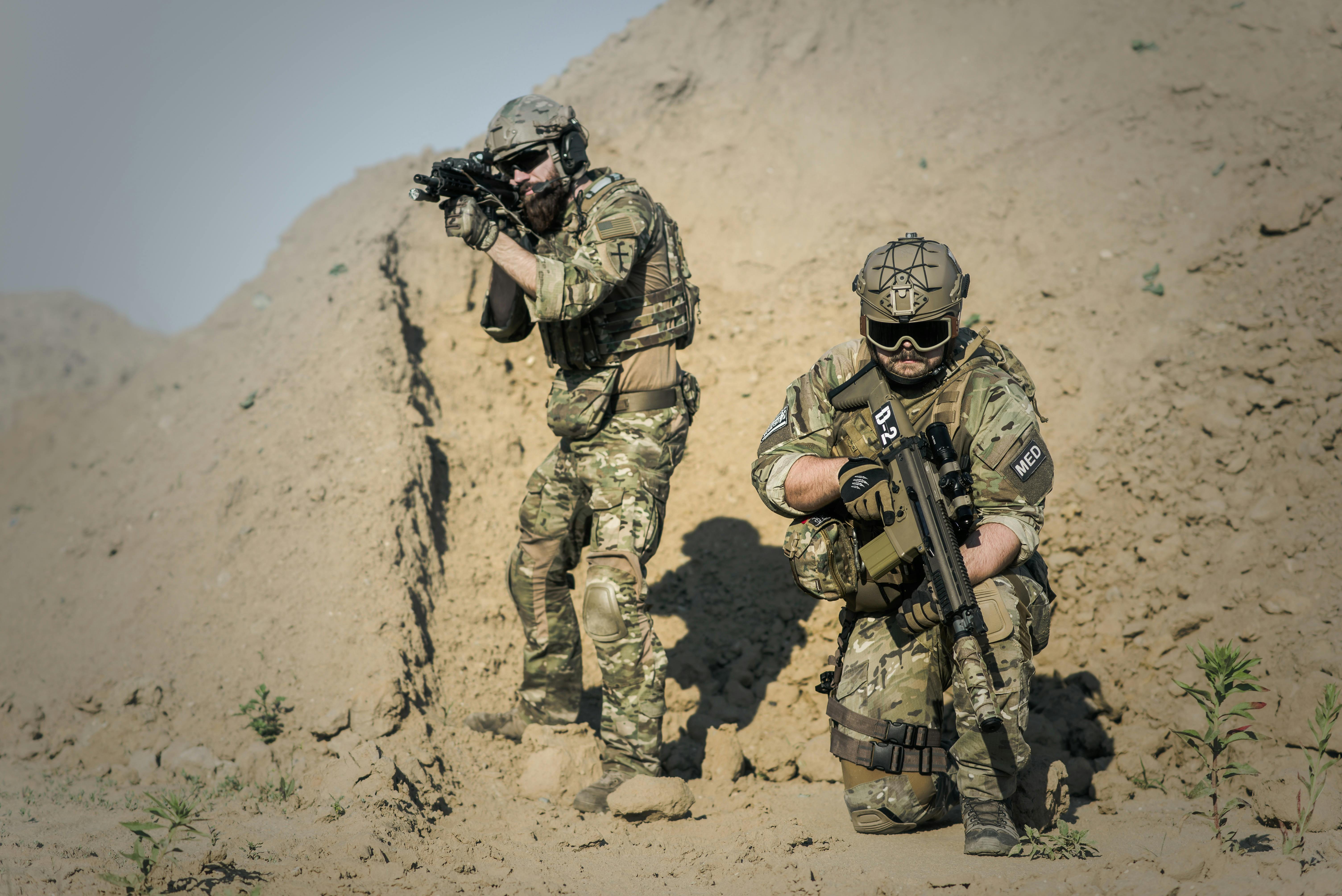 Two Men in Army Uniforms With Guns \u00b7 Free Stock Photo