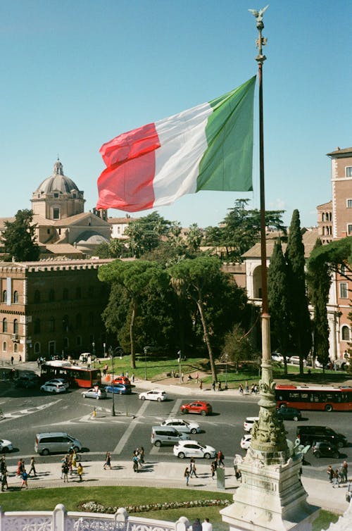 Cars and People under Italian Flag, Rome, Italy