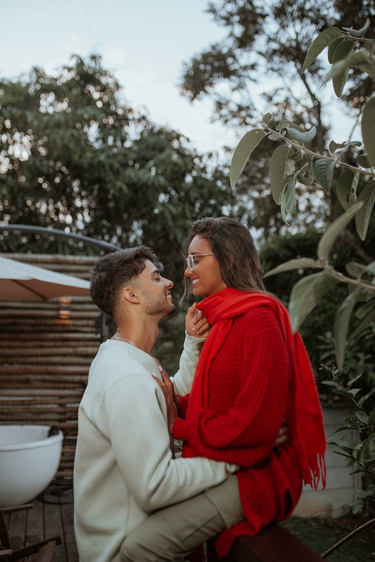 Happy Man And Woman In Garden