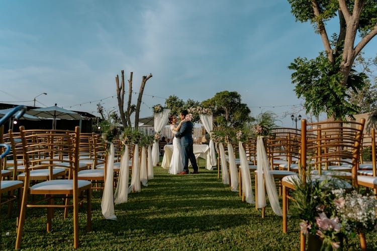 Newlyweds Hugging In Garden