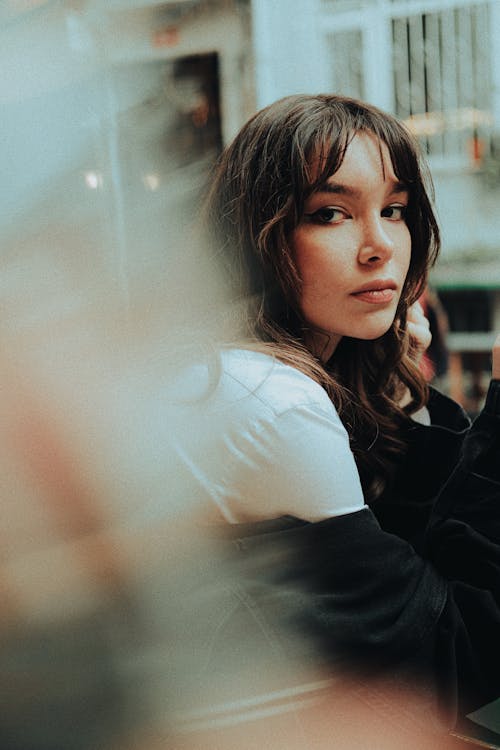 Young Brunette with Bangs Wearing a Casual Outfit