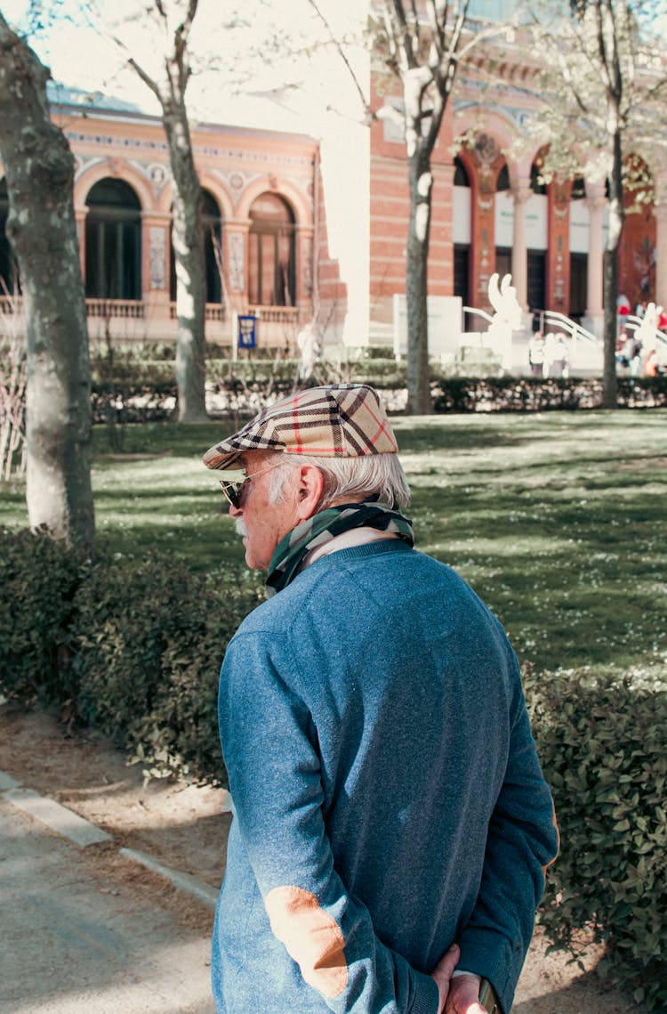 Eldery Man Walking In The Park