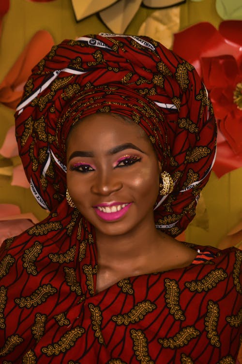 Portrait Photo Of Woman In Red And Brown Top