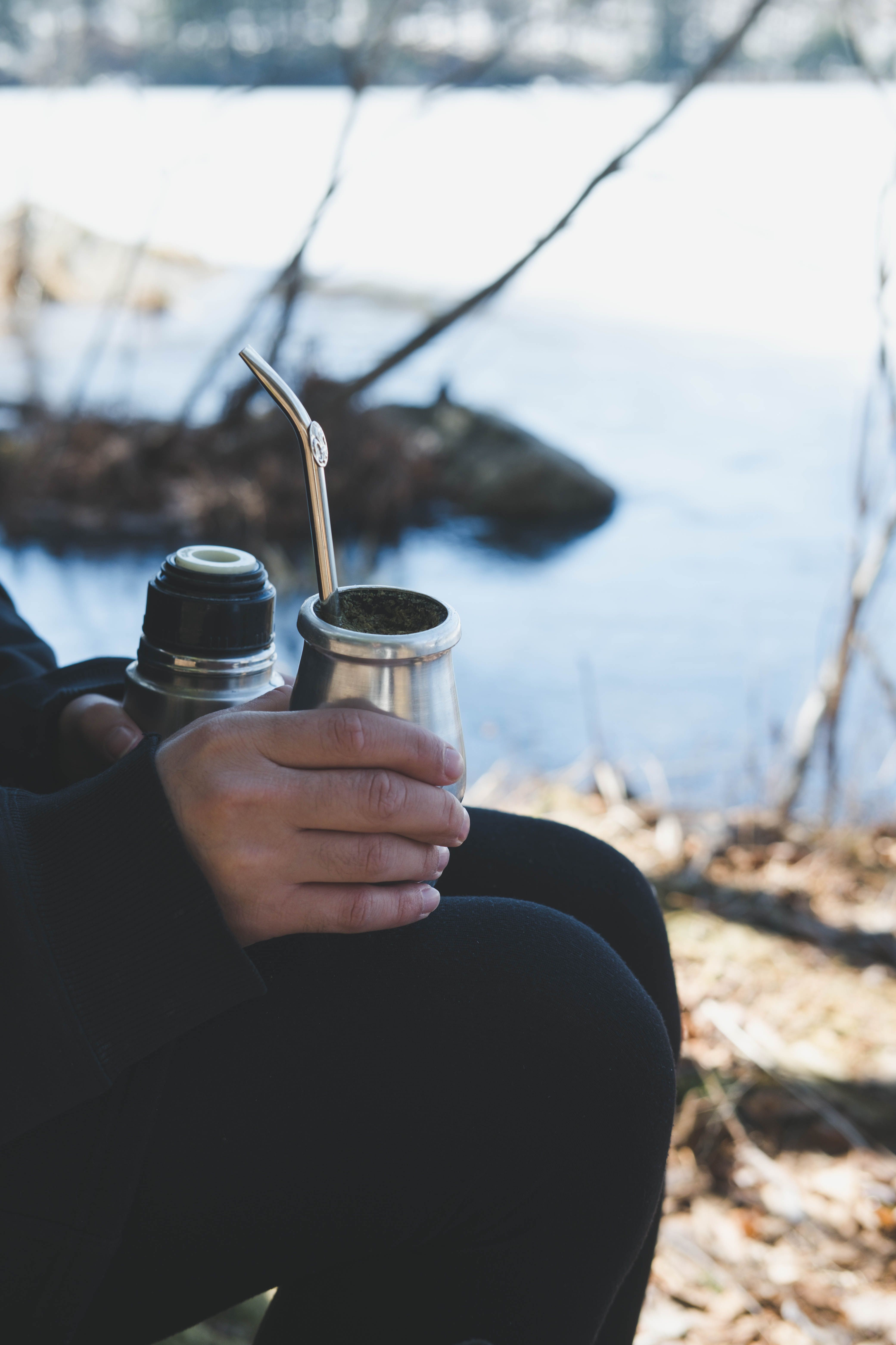 A Person Sitting with a Cup · Free Stock Photo