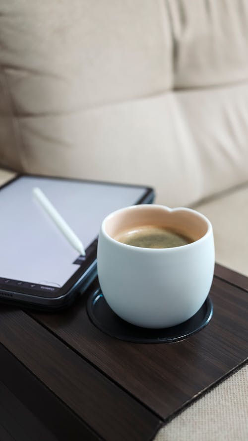 Coffee Cup near Tablet