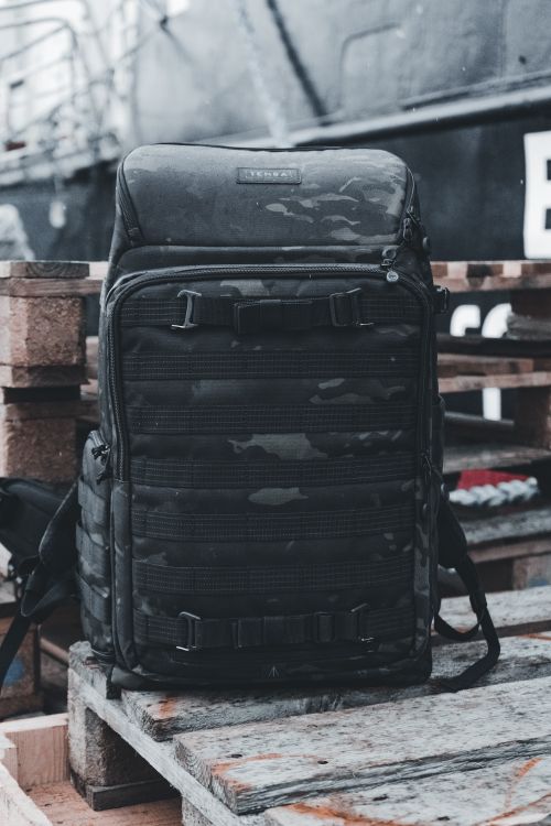 A Backpack on a Wooden Pallet · Free Stock Photo