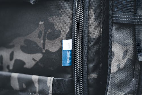 Clsoe-up of the Label and a Zipper of a Backpack