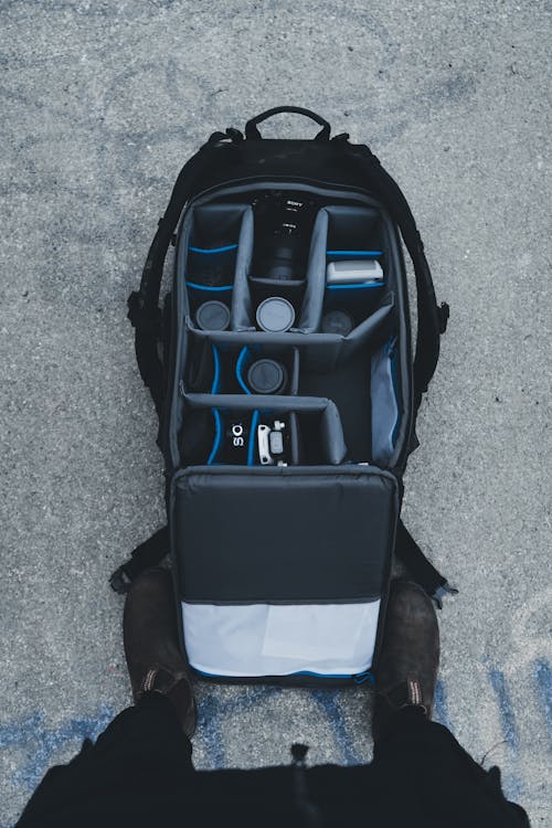 Backpack Test Electronics Close-up of Electronic Equipment in the Compartments of a Backpack ...