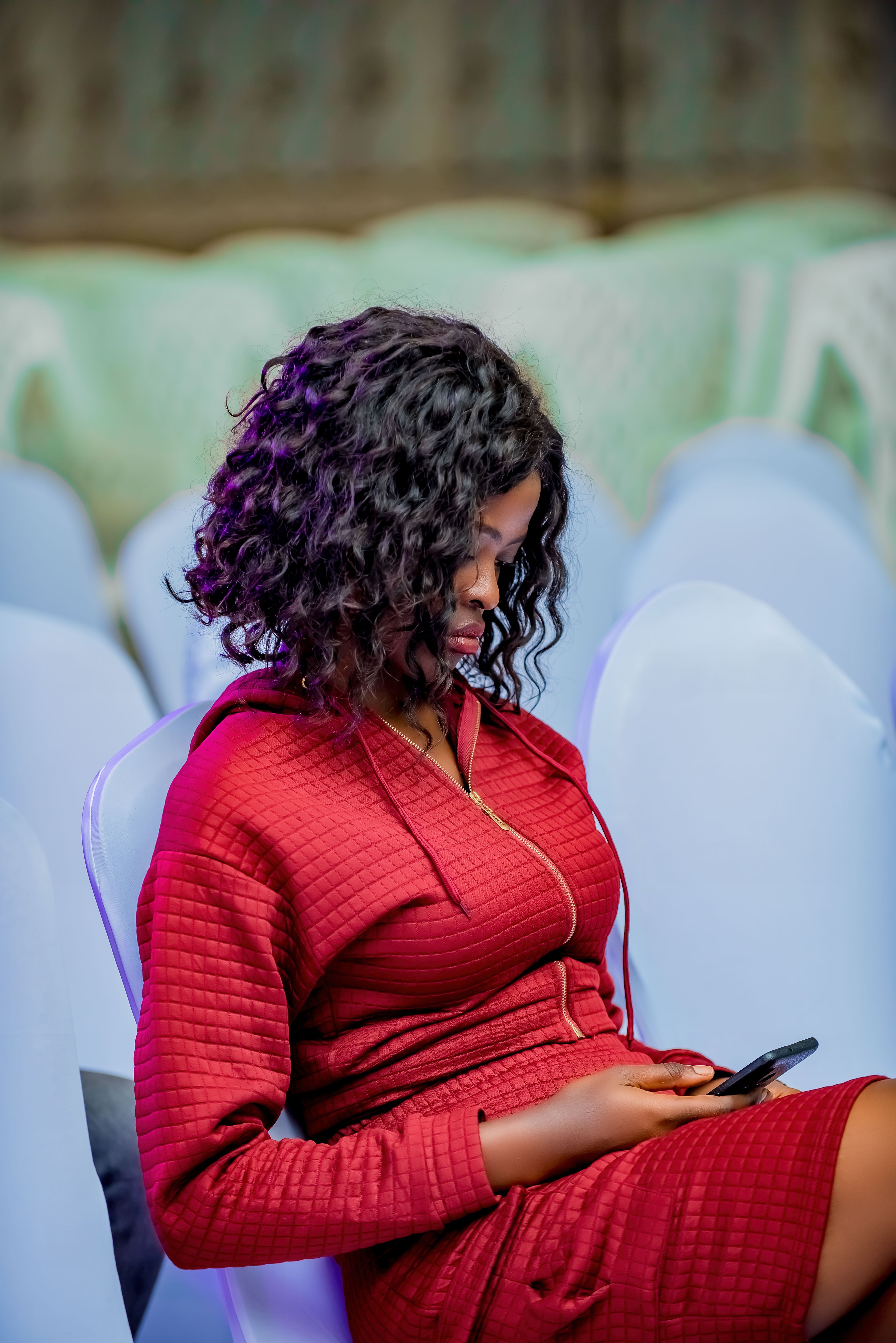 Woman in a Red Dress Sitting on a Chair · Free Stock Photo