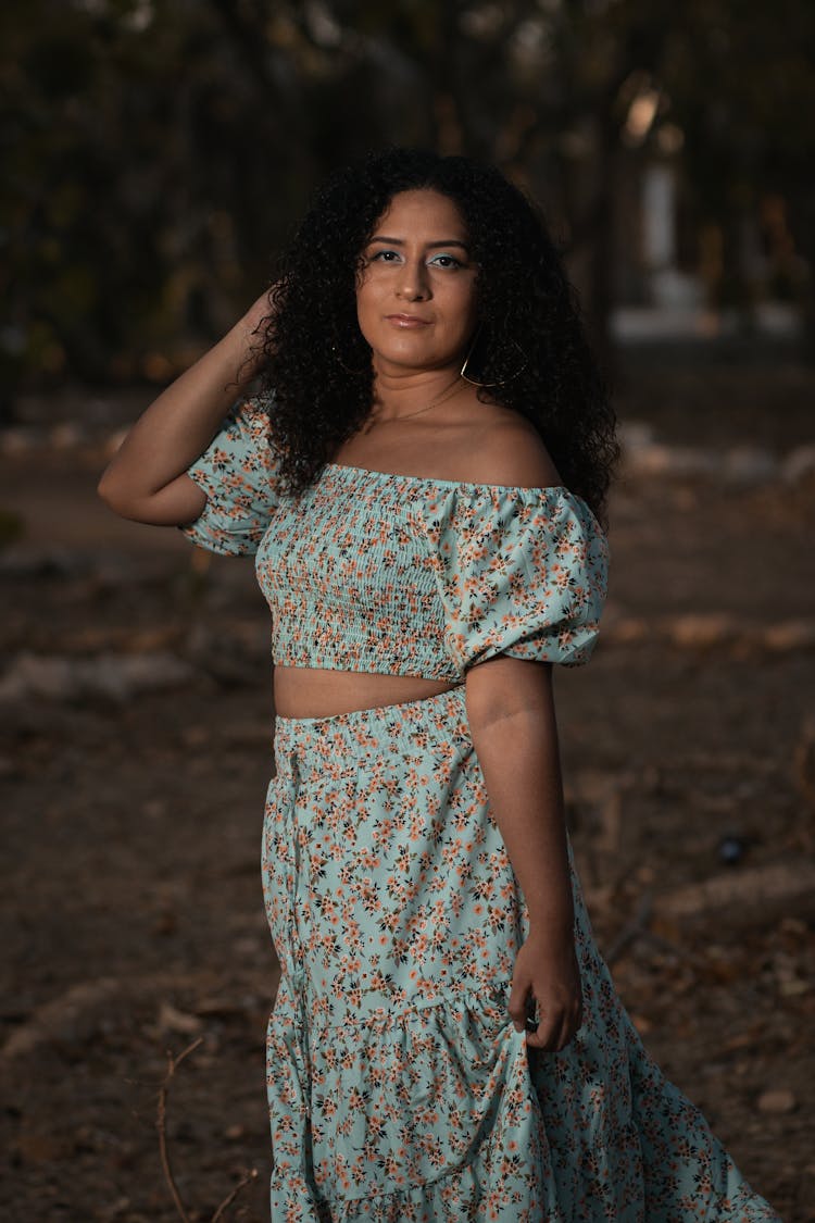 Young Woman In A Summer Outfit Standing Outdoors 