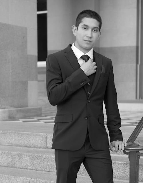 Black and White Picture of a Young Man in a Suit 
