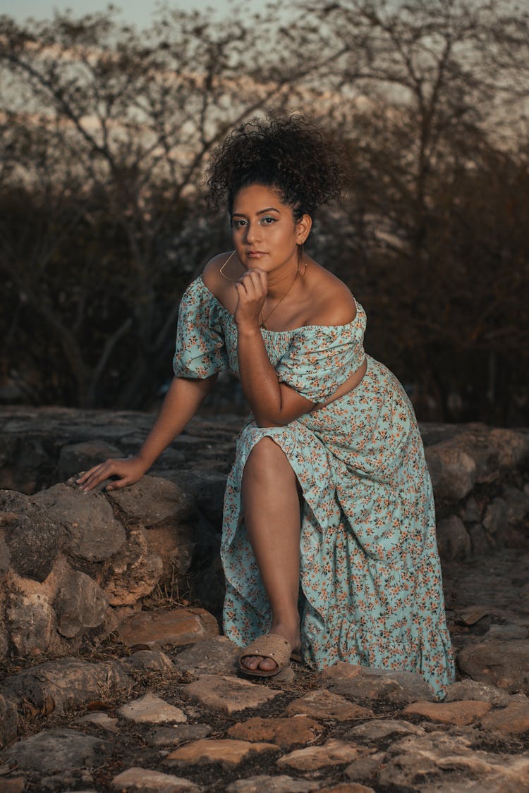 Young Woman In A Summer Outfit Standing Outdoors 