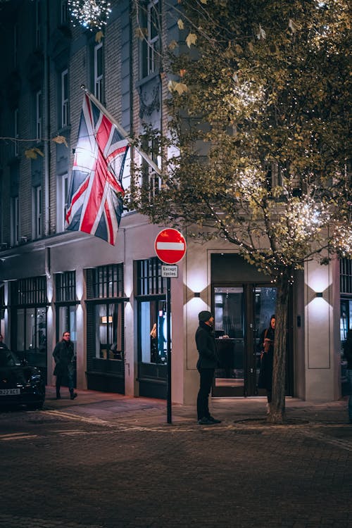 UK Flag on a Street at Night 