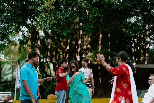 Wedding Guests in Traditional Clothing Dancing at the Reception 