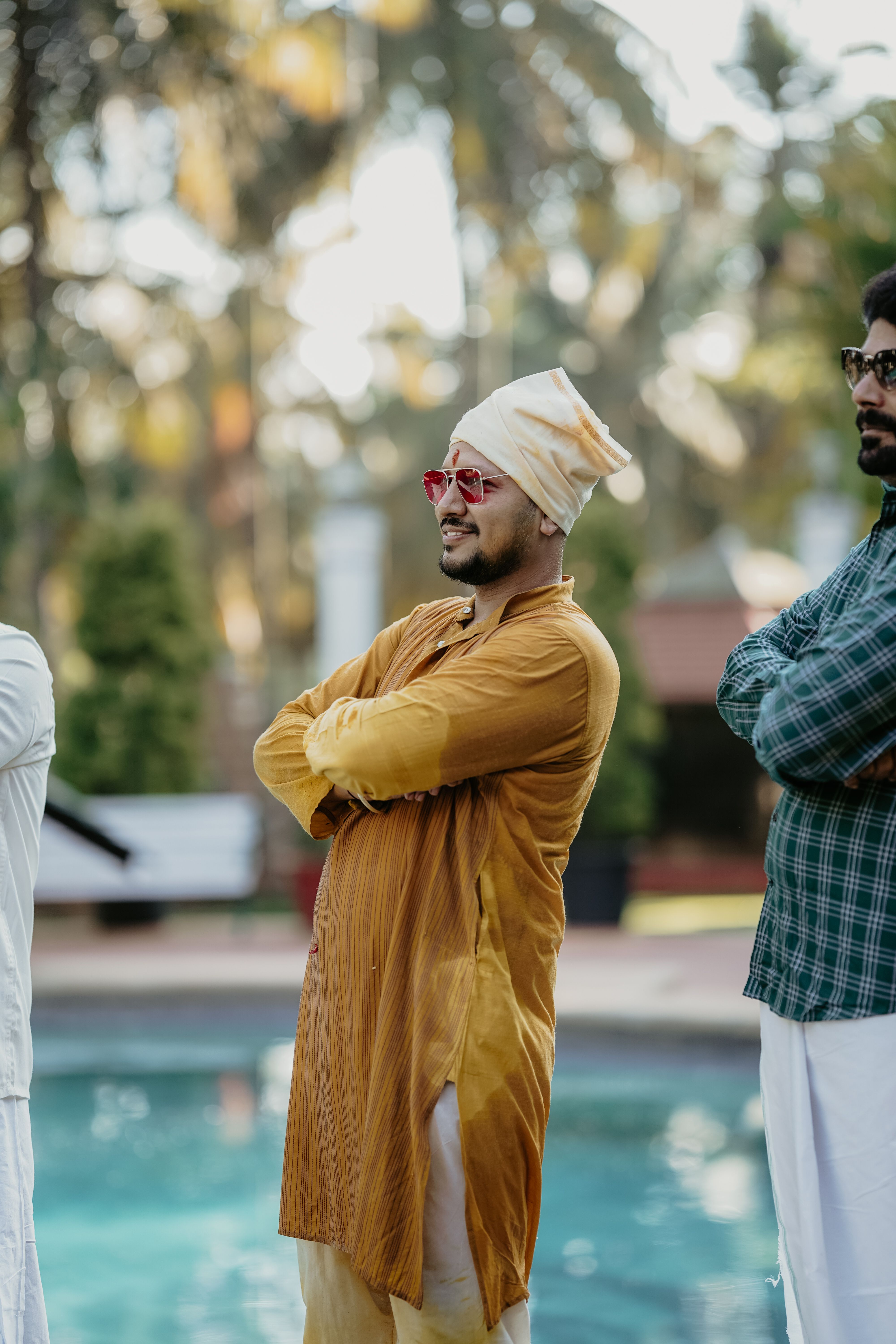 A Man in Traditional Indian Clothing Over the Pool · Free Stock Photo