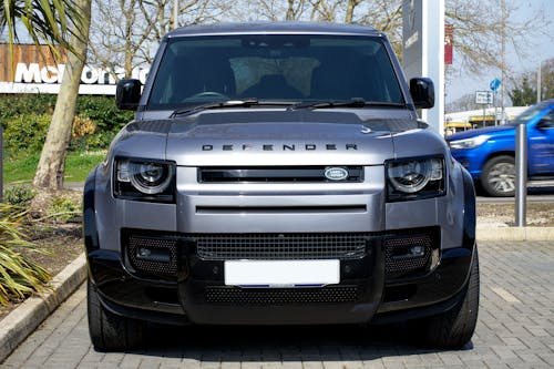 Silver Land Rover on a Street 