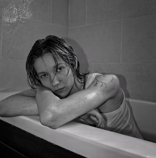 Young Woman Posing in Bathtub