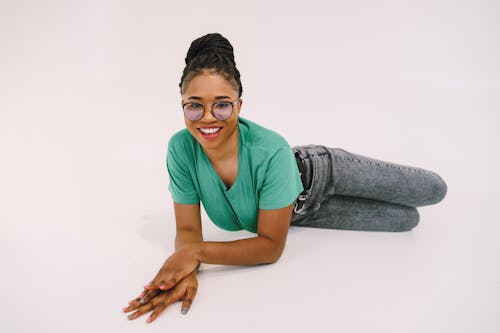 Smiling Woman Lying on the Floor