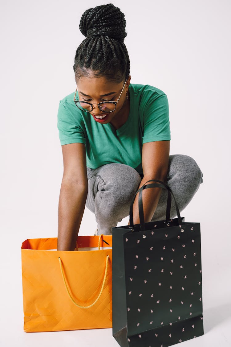 Woman Unpacking Shopping Bags