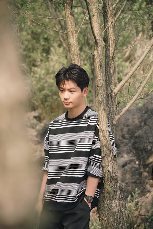 Man Posing near Tree