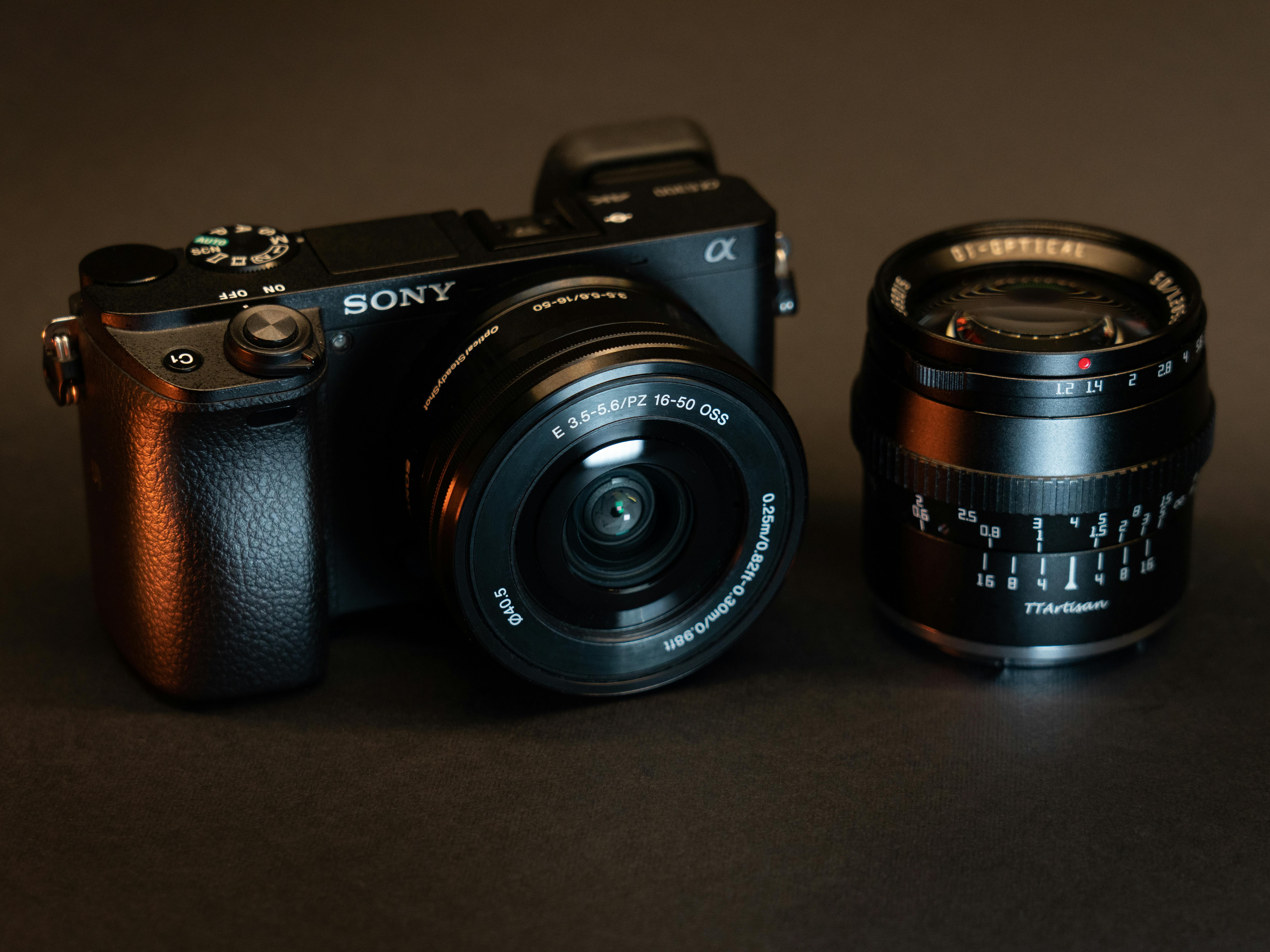 Close-up image of a professional camera and lens. Ideal for photography enthusiasts and professionals.